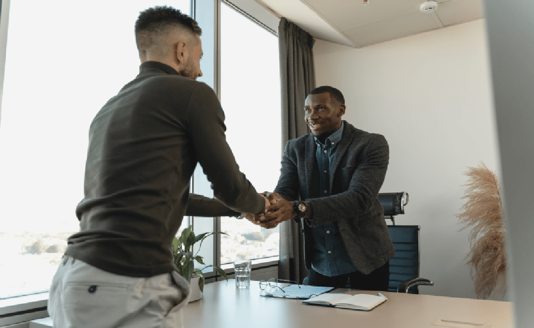 Men shaking hands after a job interview